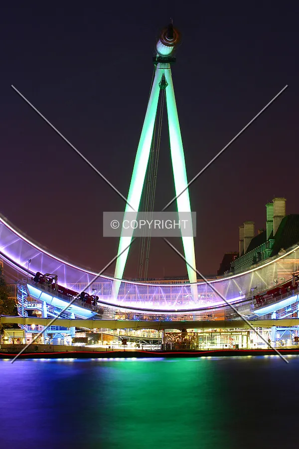 Night view east from Victoria Embankment with the A-frame illuminated in green