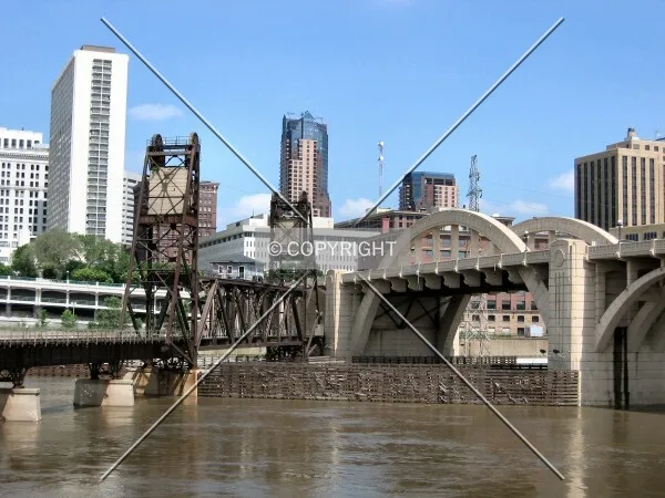 With a railroad trestle from the West Side