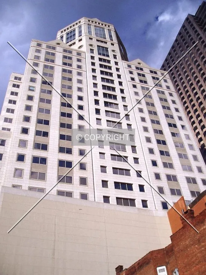 From below on Pearl Street, with City Place I on the right
