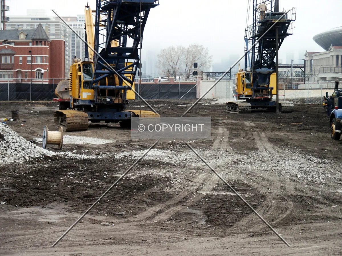 Drilling cranes on the north side of the site