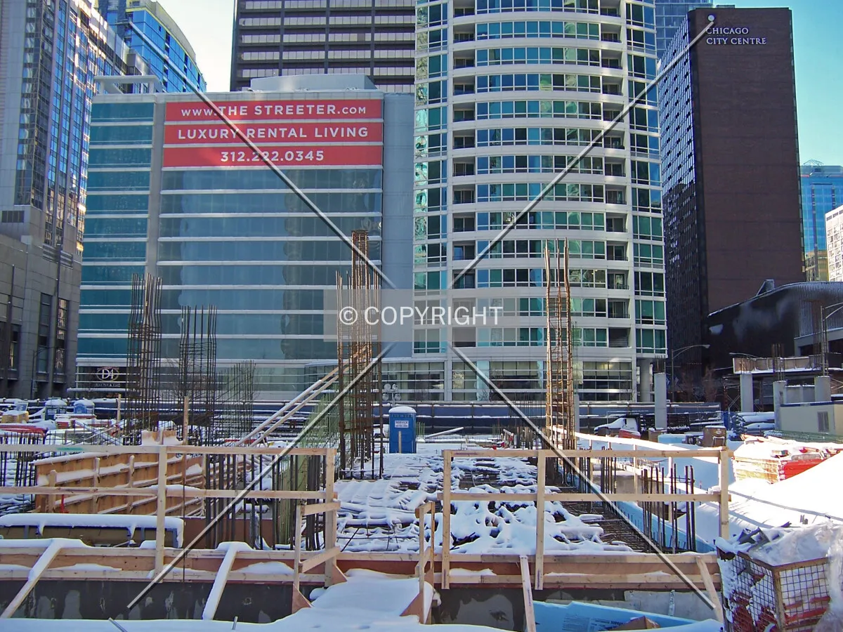 Looking west across the base of the tower core from McClurg Court