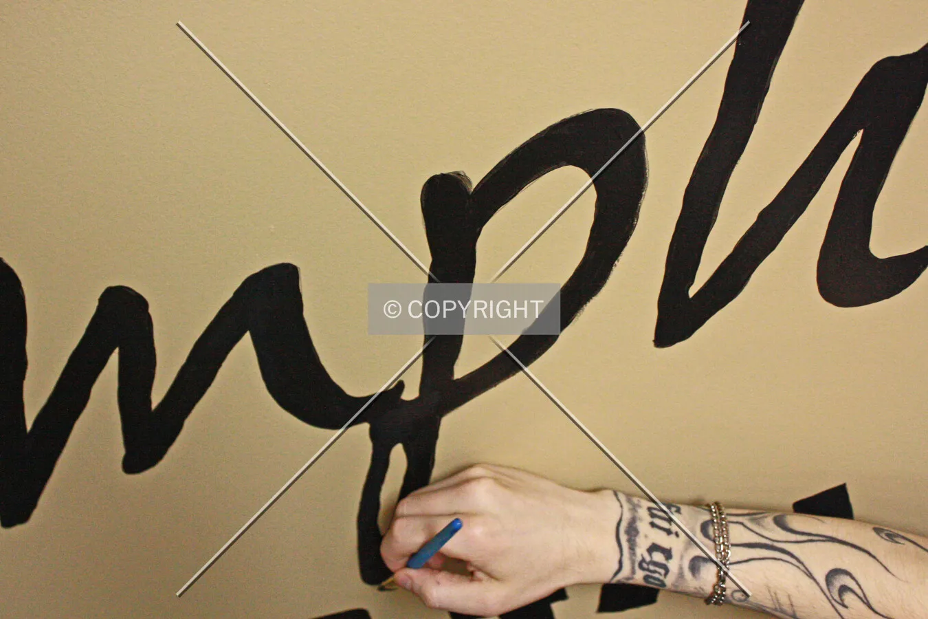 Man painting a wall
