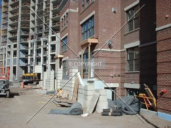 Entrances to Grant Street townhomes, Tower rising behind
