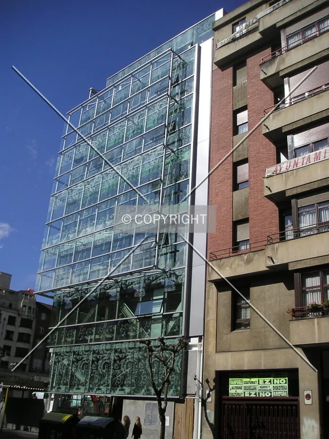 In comparison with a nearby building