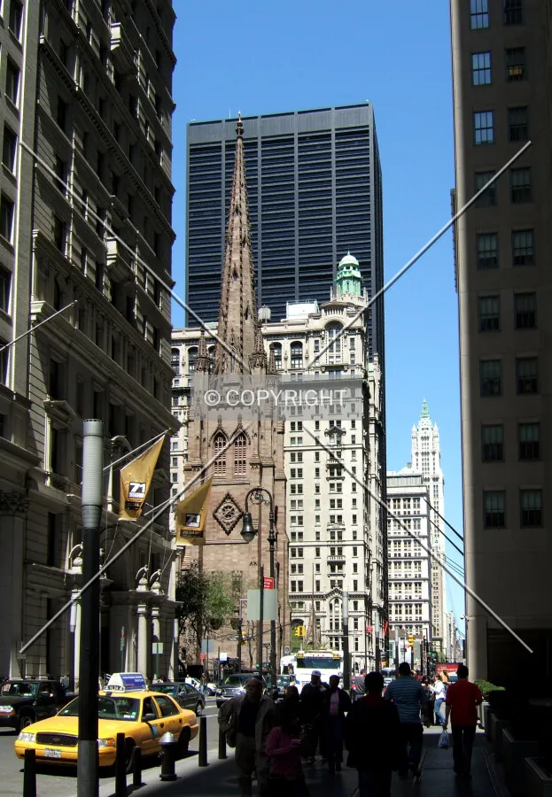 View northeast along Broadway toward Trinity Church, One Liberty Plaza, and the Woolworth Building