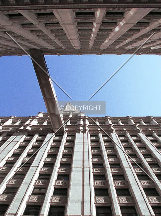 Looking up between the two buildings