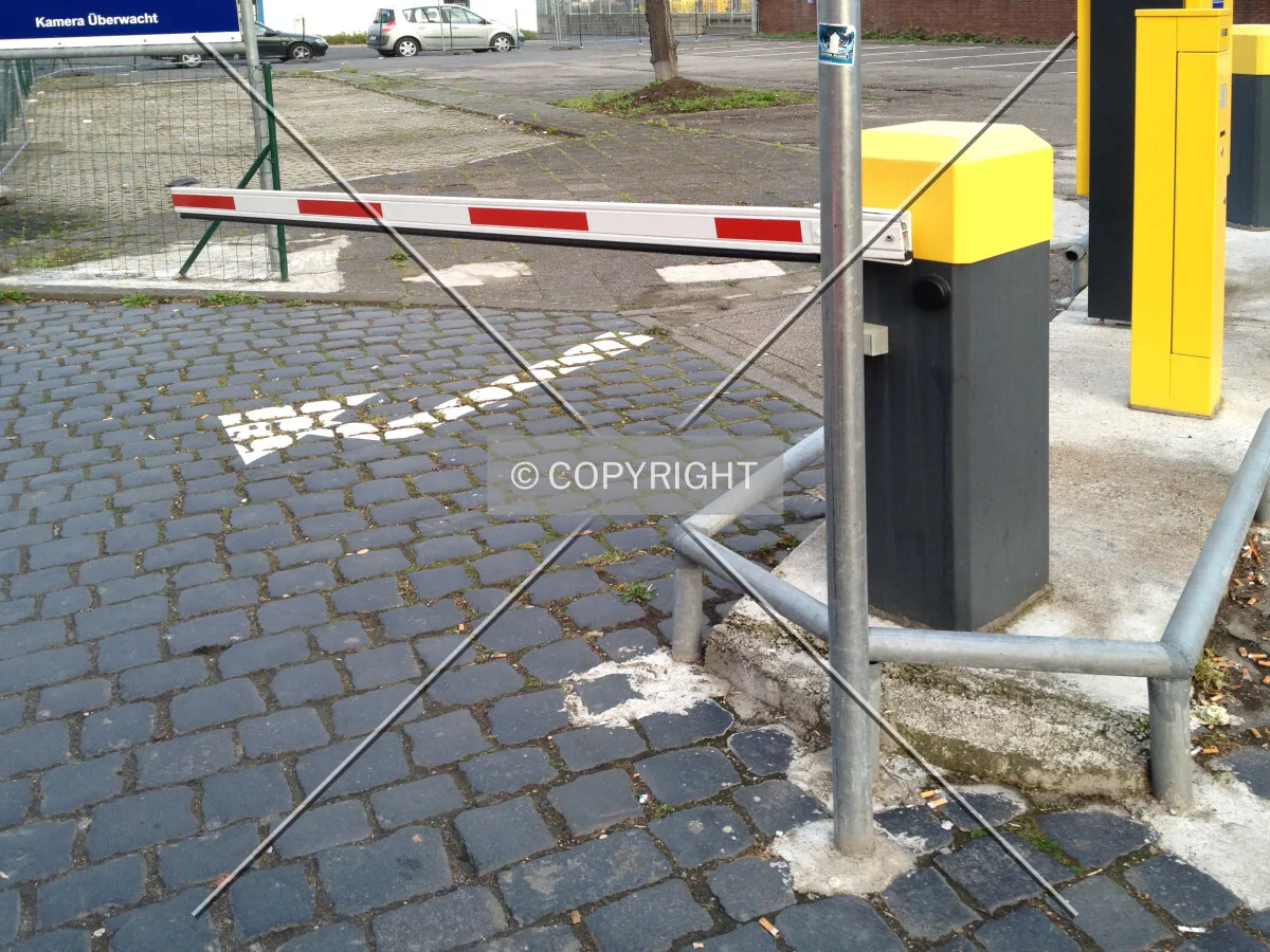 A barrier restricting access to a car park