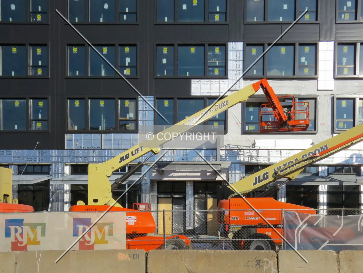 Facade installation from across 3rd Street North