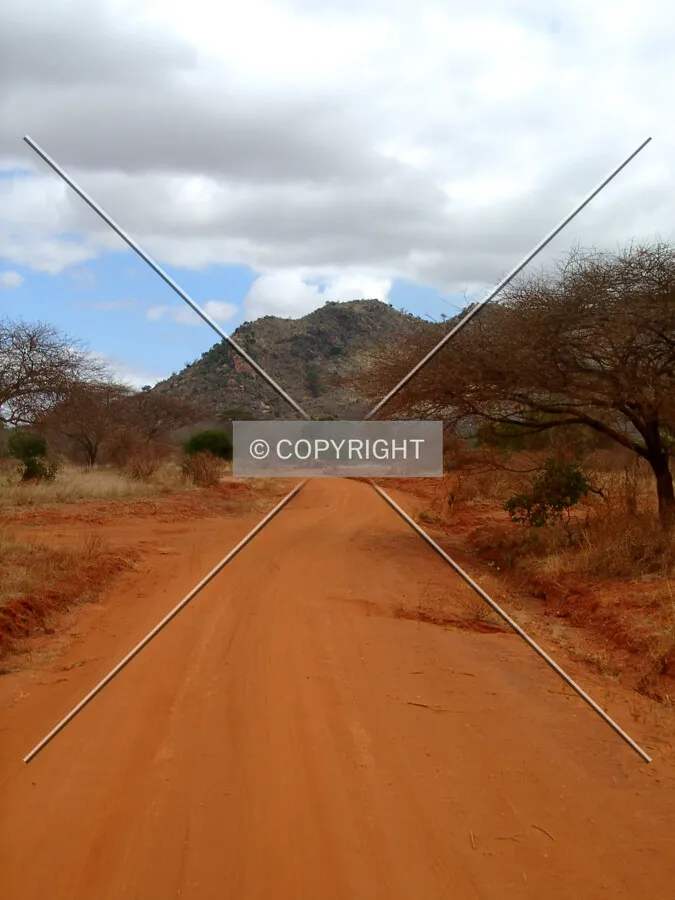 hill and dusty road in africa
