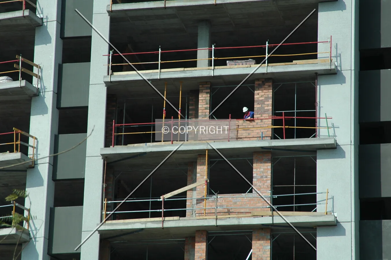 Bricks and concrete in building's facade