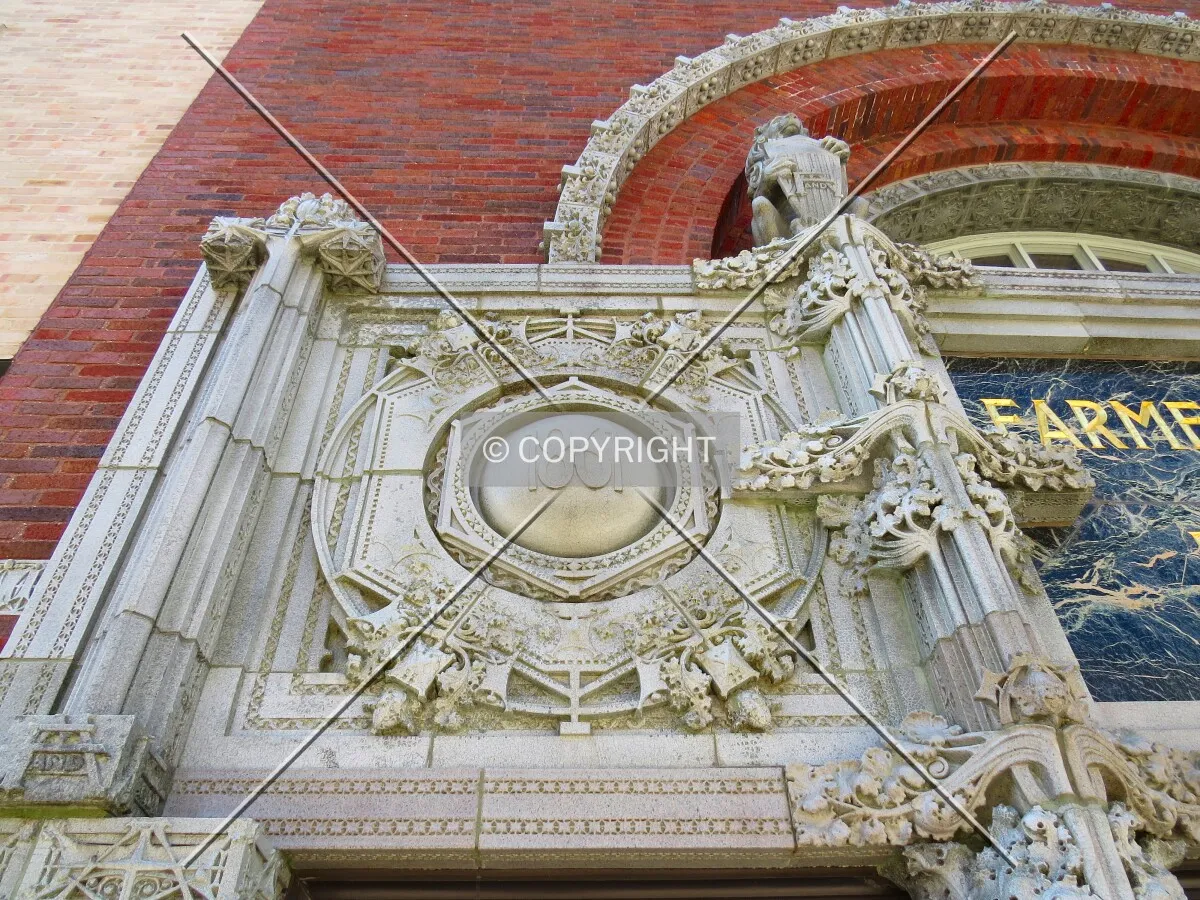 Cartouche with data of bank founding to left of main entrance
