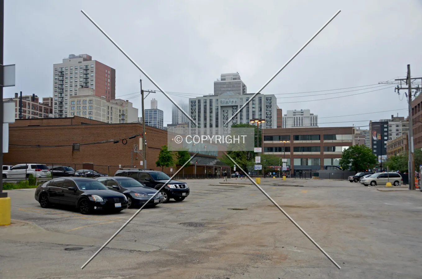 Looking east across the surface parking lot. June 30, 2015.