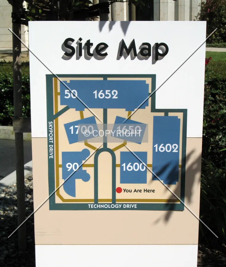 Sign near the entrance showing the site plan for the complex