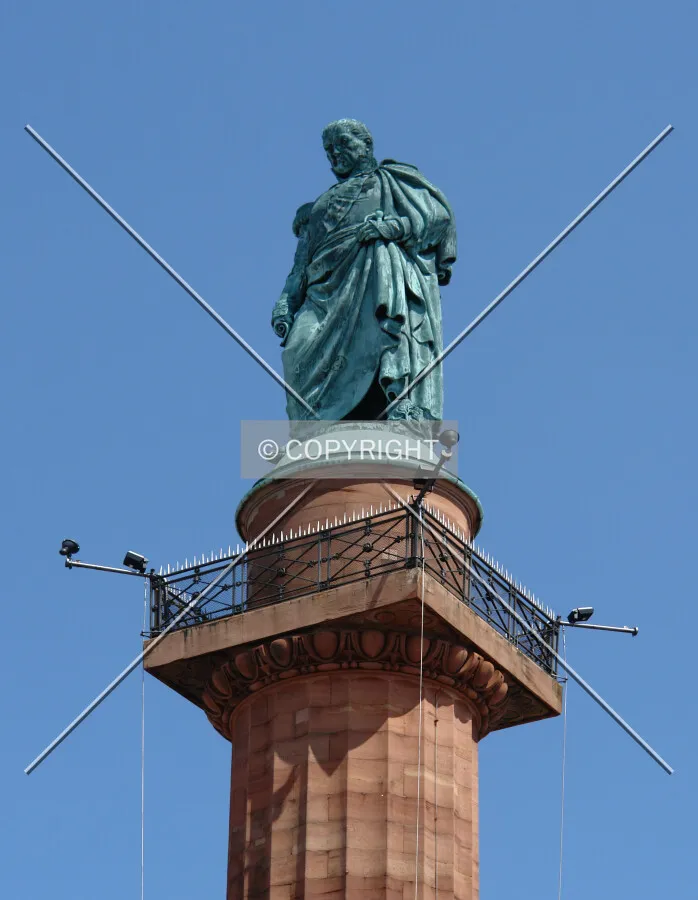 The statue on top of the monument