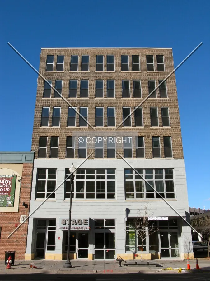 Full front elevation from across Hennepin Avenue