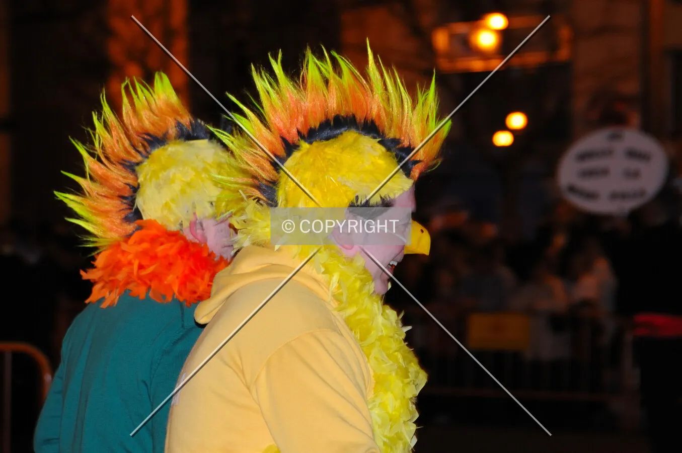 Men dressed like chickens
