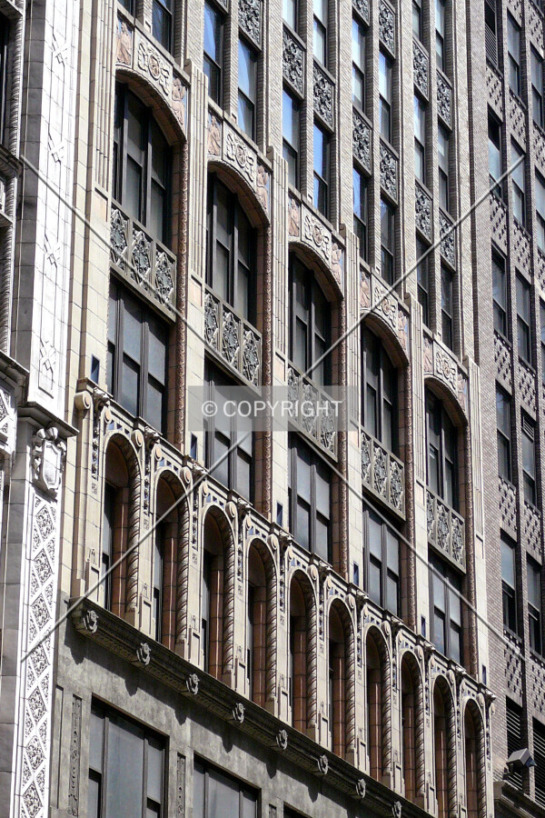 Oblique view of the lower stories on the south facade