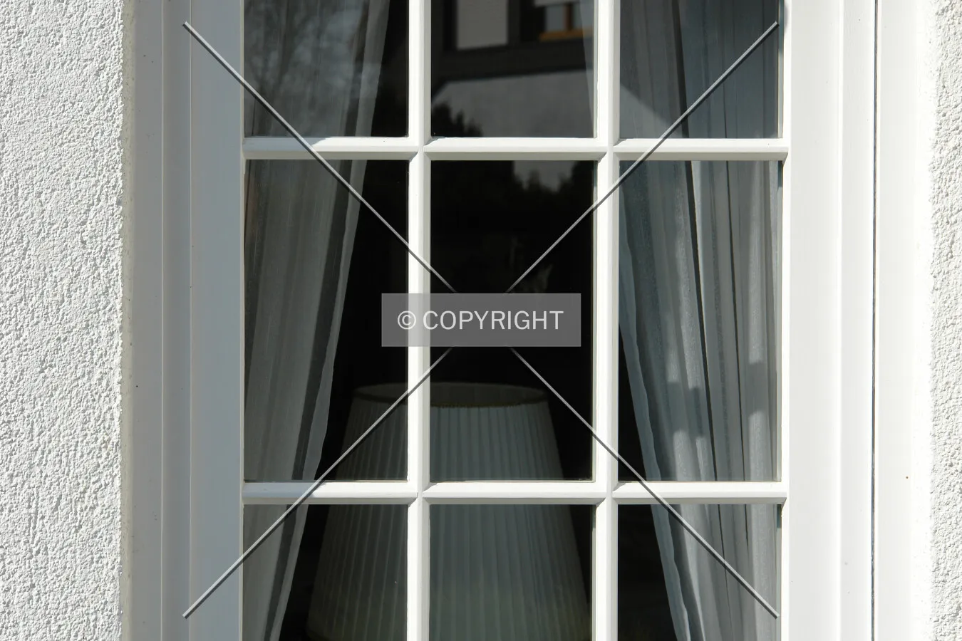 A white lattice window