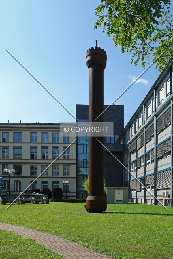 Iron pipe as artwork in the garden