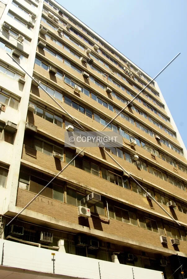 Looking up from across Doutor Flores Street