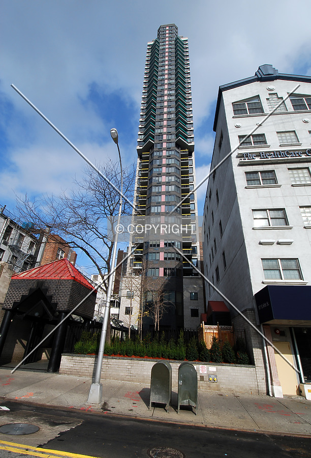 Looking up from West 60th Street