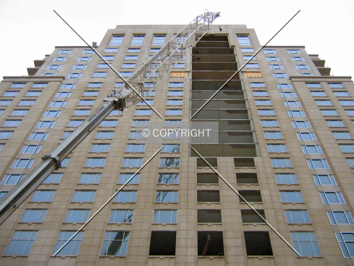 Looking up from North Illinois Street
