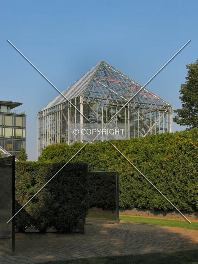 View to the northwest over Dan Graham's "Two-way mirror punched steel hedge labyrinth"