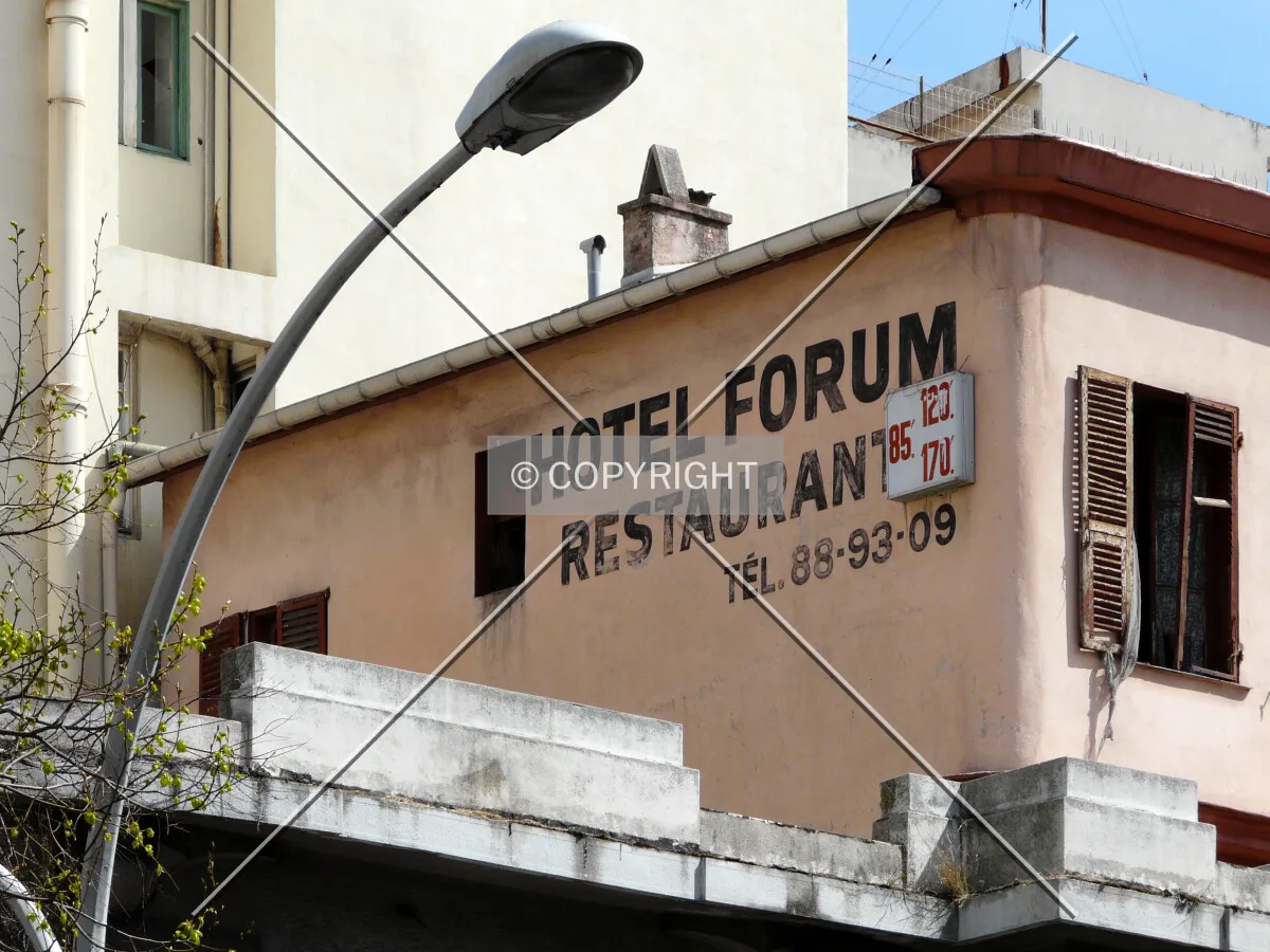 Former hotel's old signage on top of north side