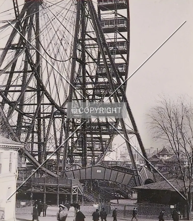 A photo of a photograph of the base on display at The 1904 World's Fair exhibit; January 18, 2025. Photograph by Official Photographic Company and is held by the Missouri Historical Society Collections (P0166-502-4g)