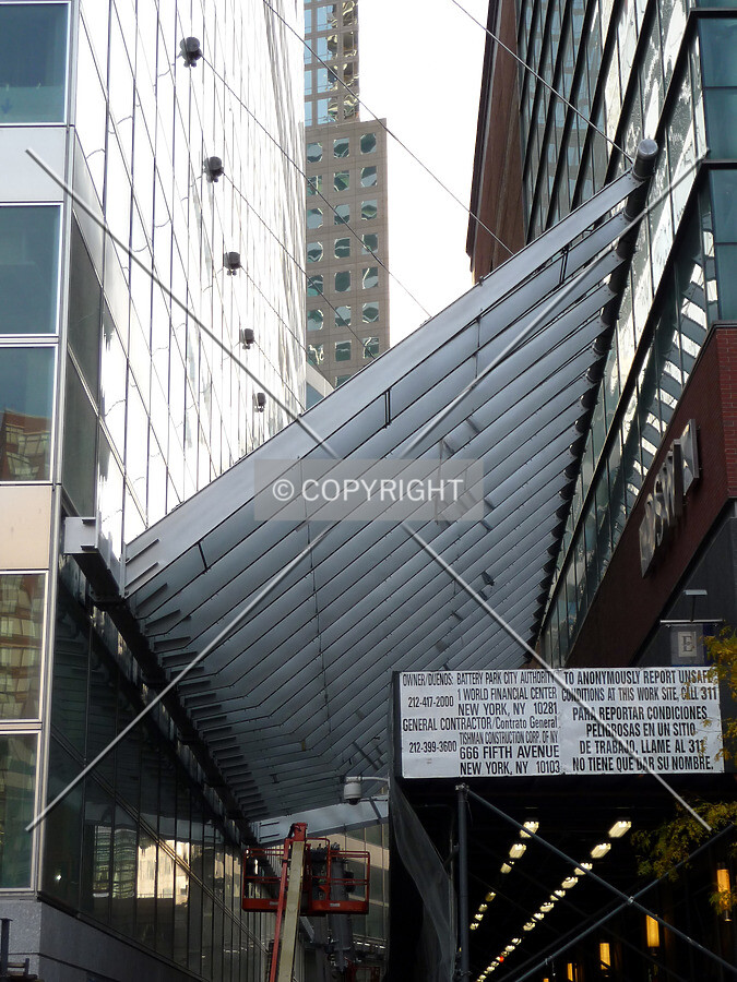 Canopy along west side of the building