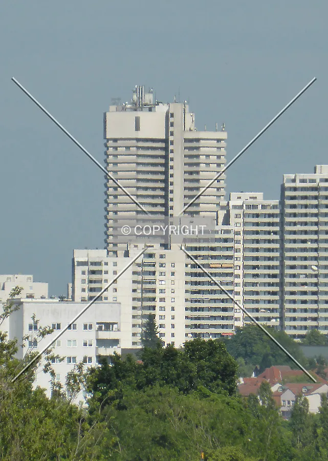 The hotel tower in the center back, as seen from Frankfurt's city center