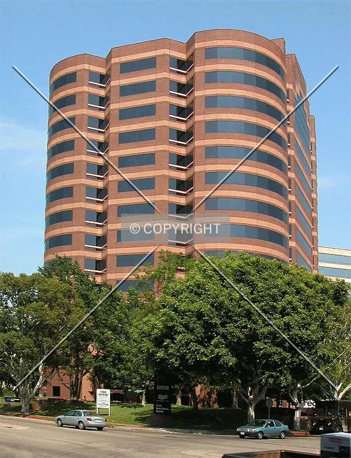 Shade trees surround Central Park Building