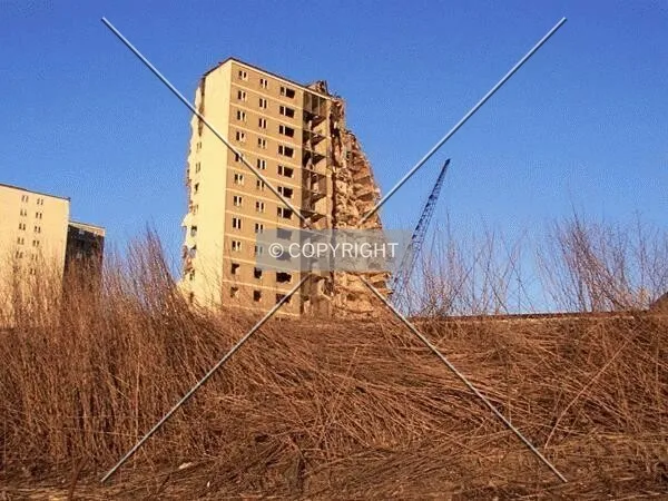 Demolition, looking over the Rock Island railroad embankment