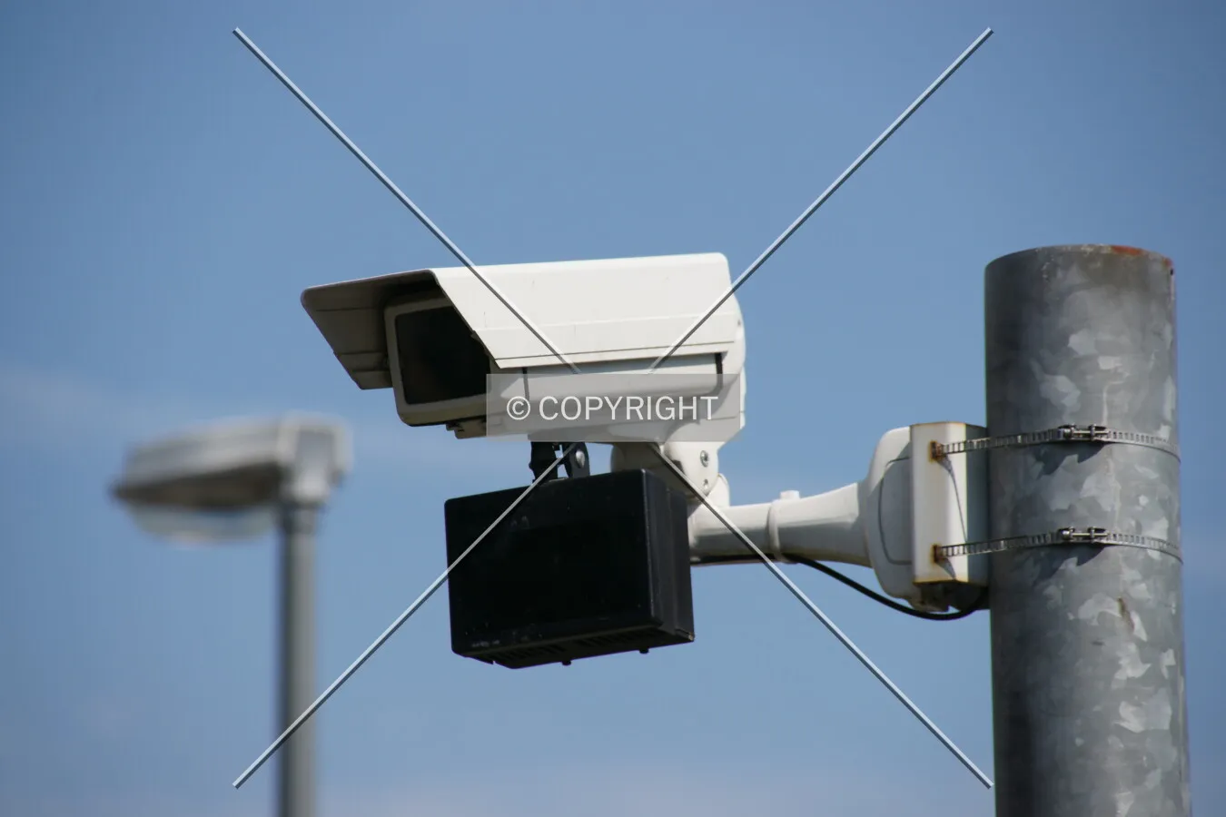A security camera including a night-time device