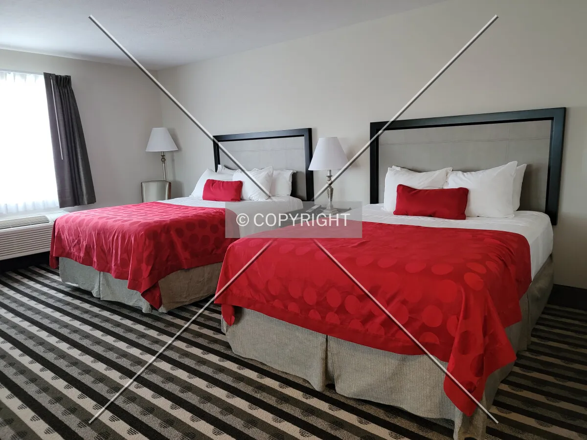 Queen beds in a guest suite; April 9, 2021