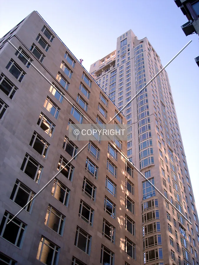Looking up from West 61st Street