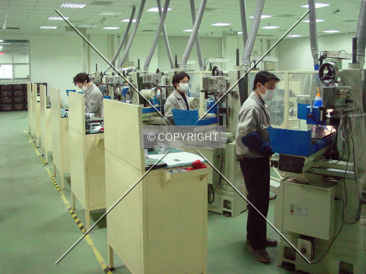 Workers in a production plant