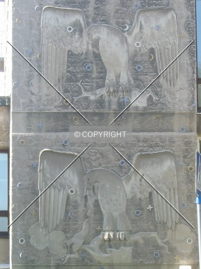 Bas-reliefs of eagles on the eastern base