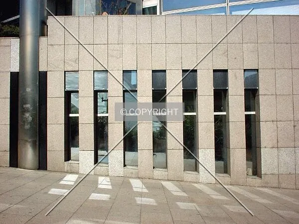 Facade detail at the walkway near the tower's base