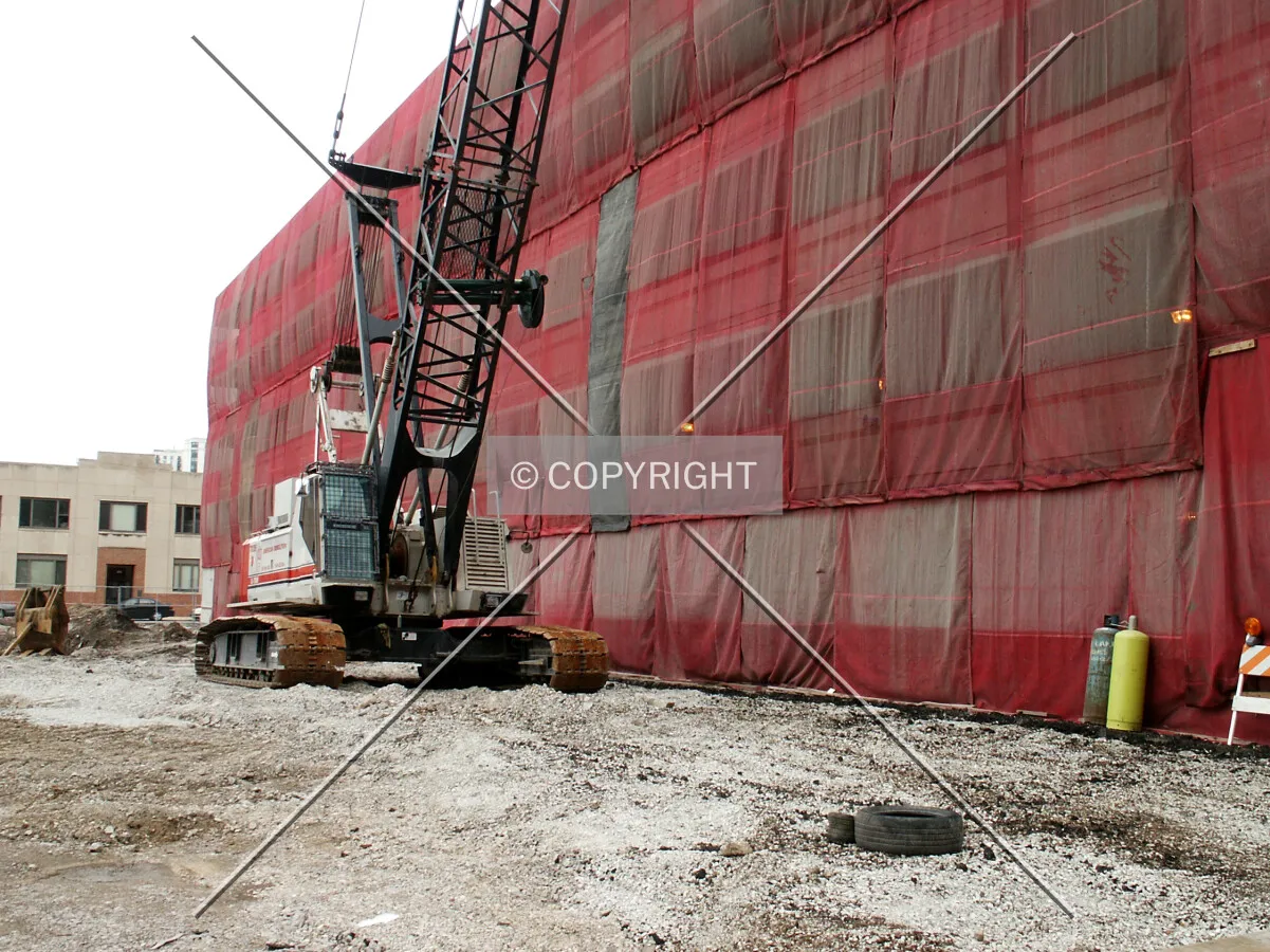 East side of the site with the adjoining garage wrapped up