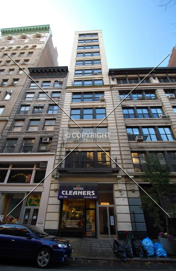 Looking up from West 15th Street