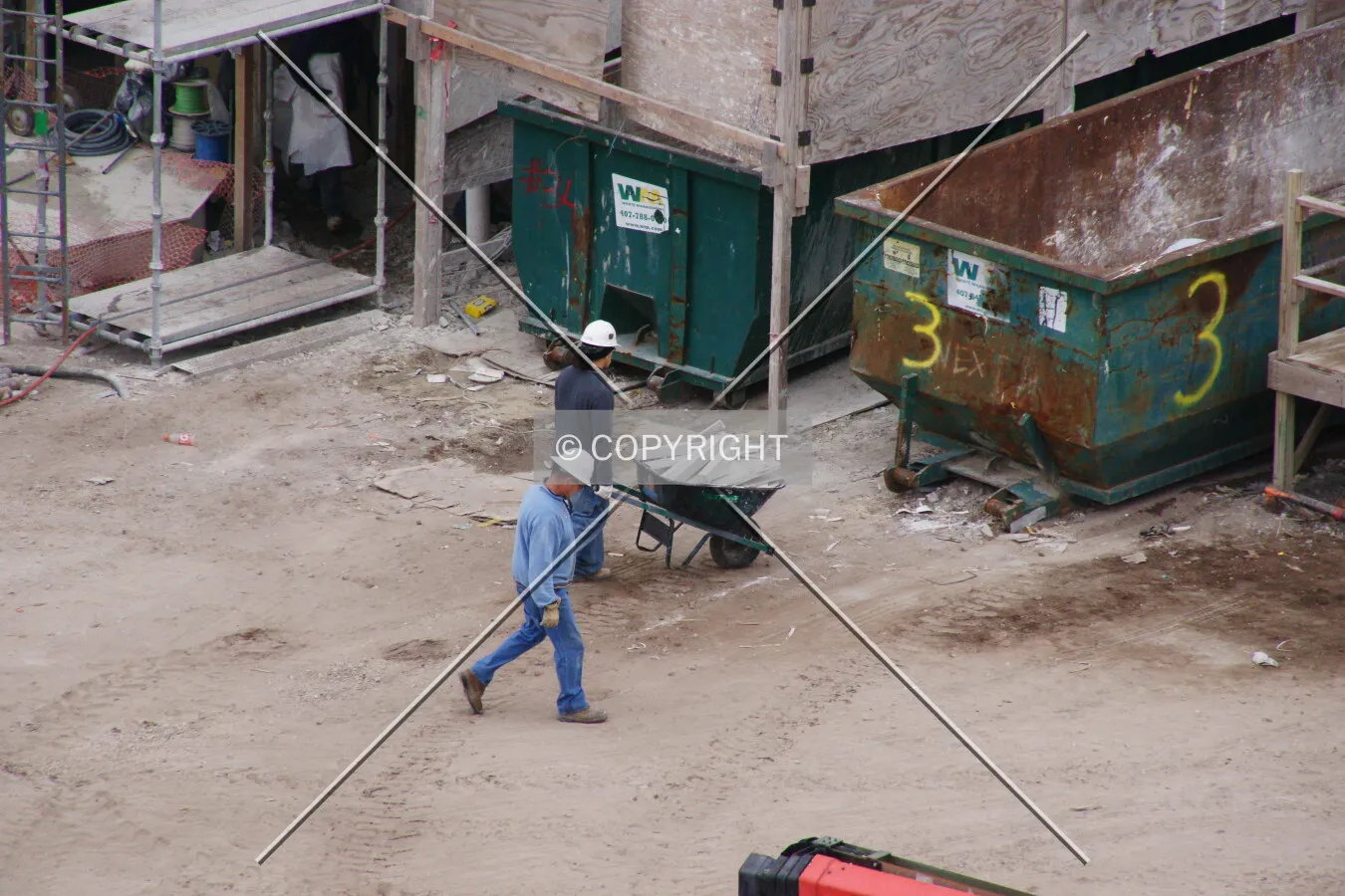Two construction men at work