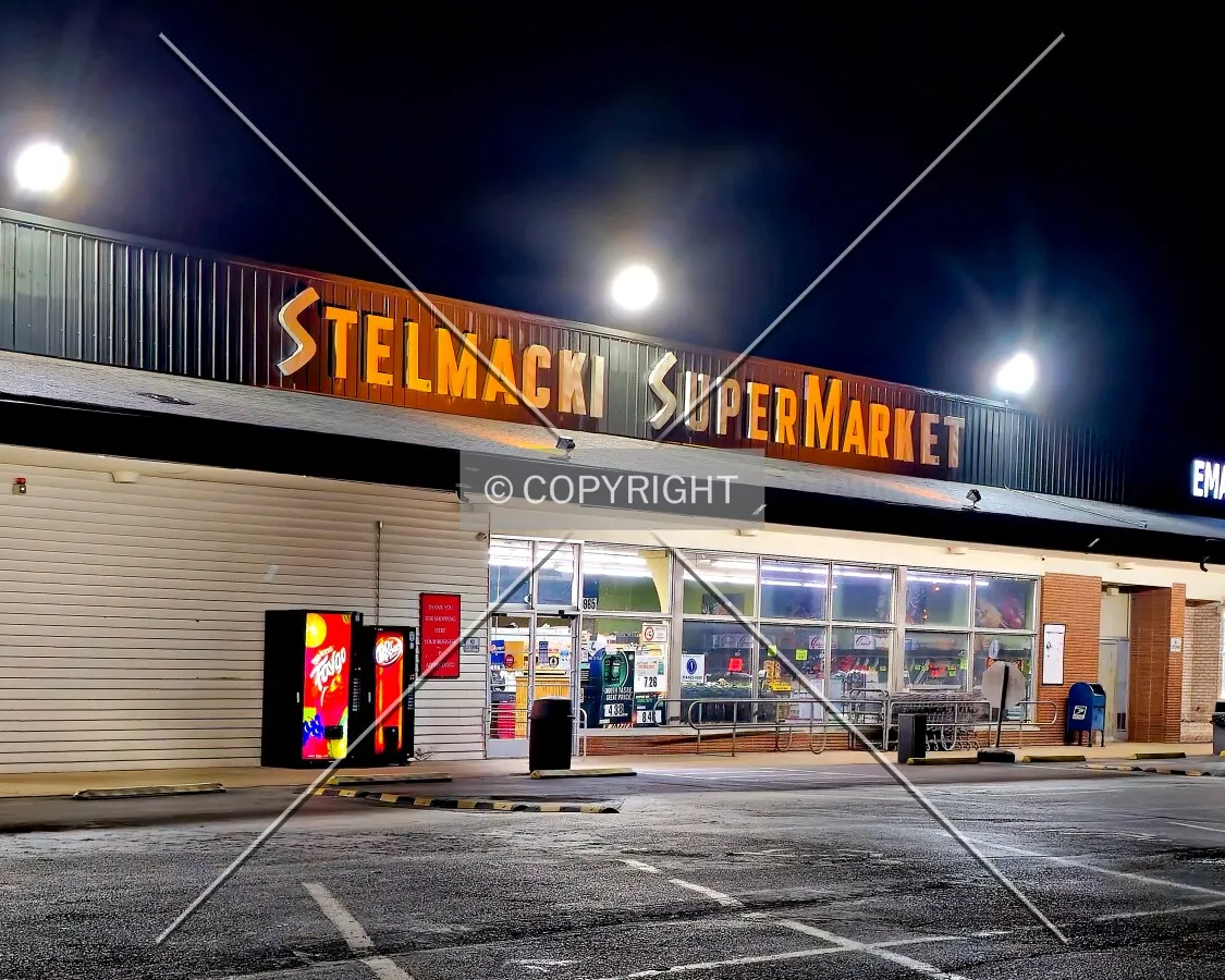 Front of a shop at night; November 16, 2024