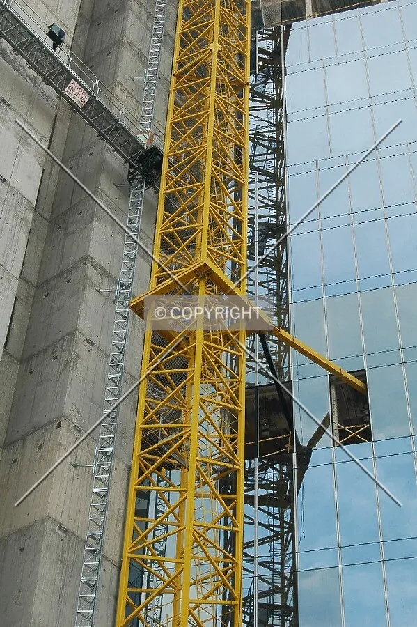 Crane reflexed on wall