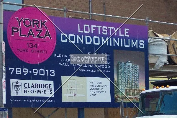 The sign adorning the north side of the construction site