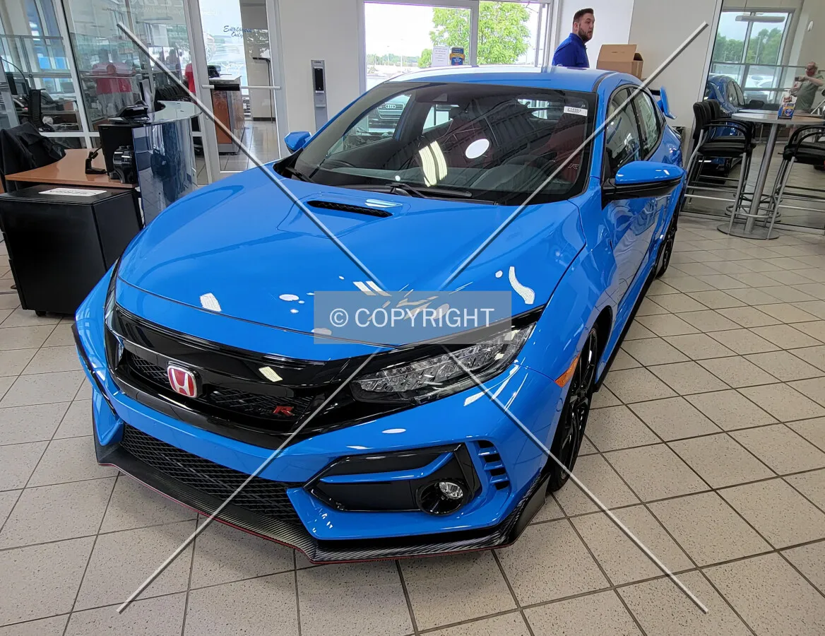 A 2020 Honda Civic in the showroom; May 15, 2021