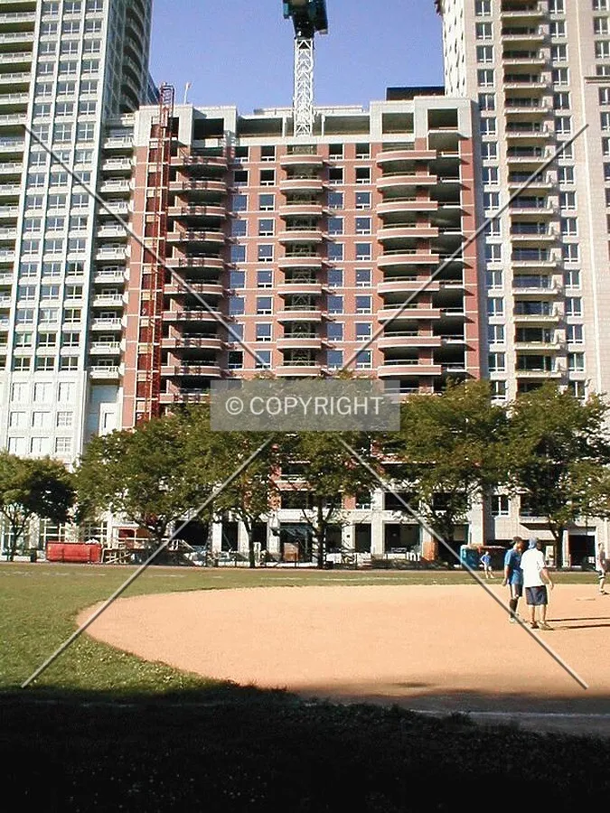The site is hemmed in between two other high-rise condominiums in the same master project