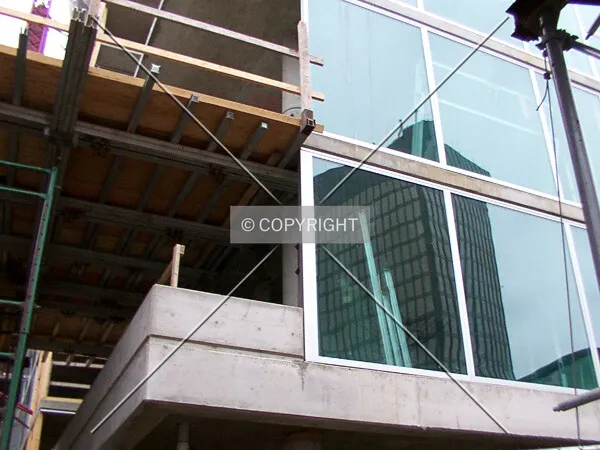 New curtain wall with a reflection of the Bank One Building