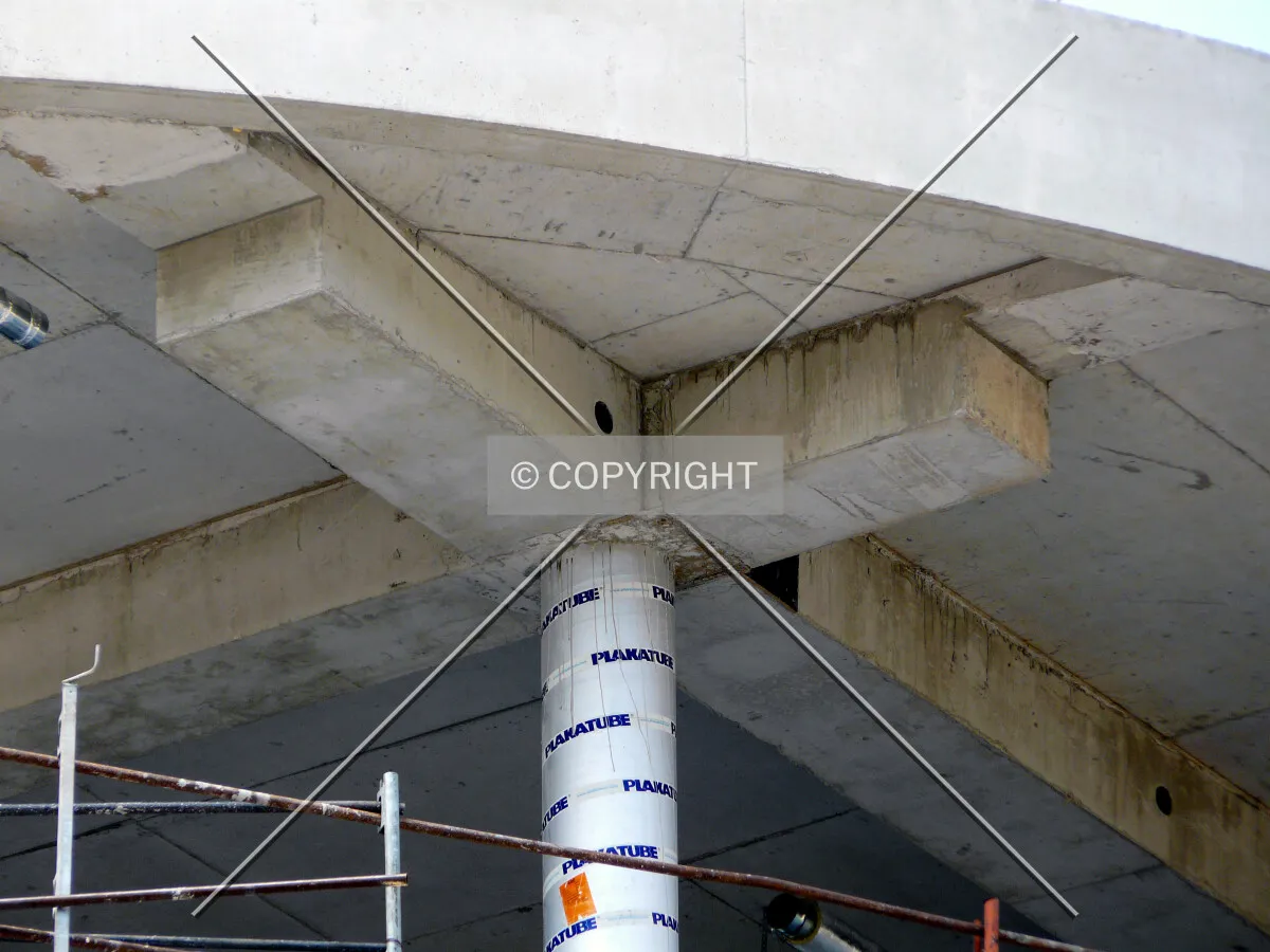 Concrete column and beams on top of the last floor