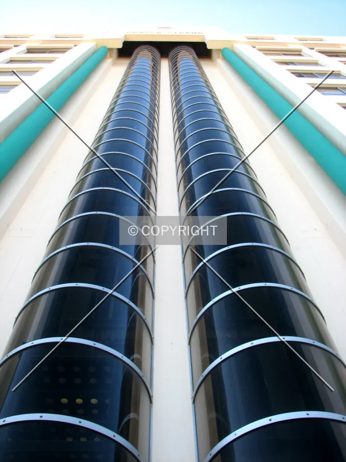 Looking up the external elevator shafts in the main facade